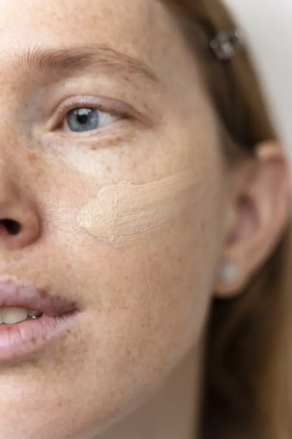 woman-wearing-foundation-close-up (1) Pigmentation treatment on a face